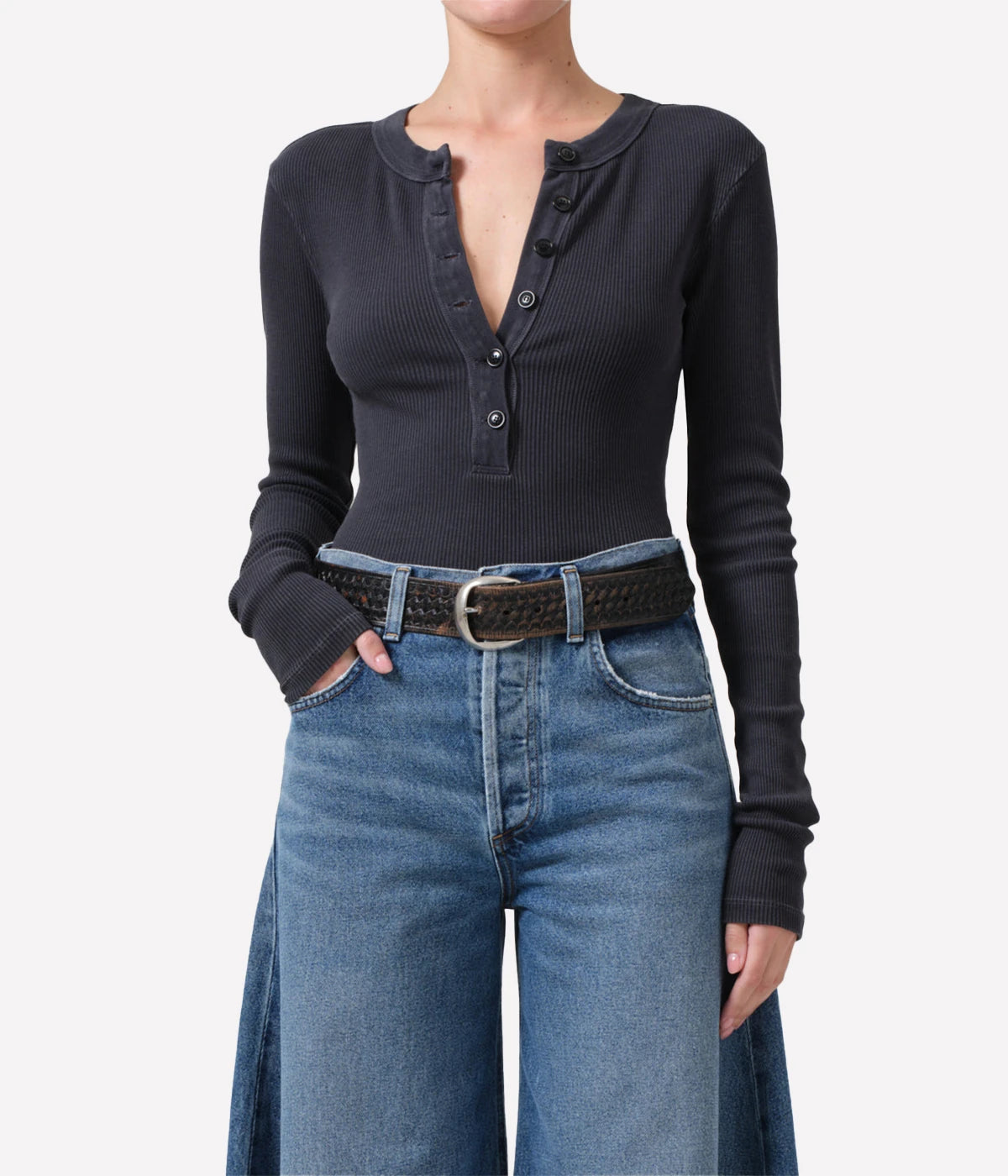 ALT Text: Form-fitting ribbed henley in neutral tone, featuring button-up detailing for a versatile, casual look.