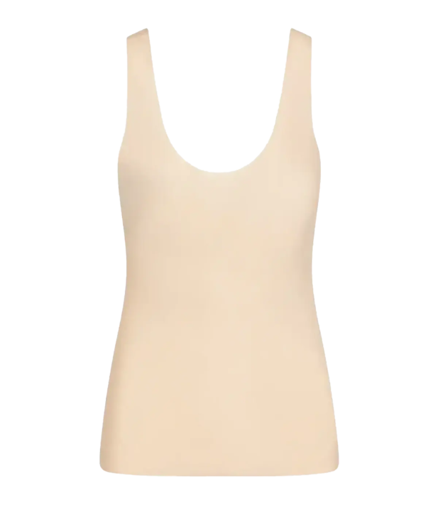 The Whisper Weight Cami is the lightweight layer you'll wear with everything or as a tight-fitting second layer. Constructed with a breathable European microfiber that disappears against the skin, finished with raw-cut edges that lay flat against the body for a seamless look, in a neutral beige colour. Everyday wear or underwear.