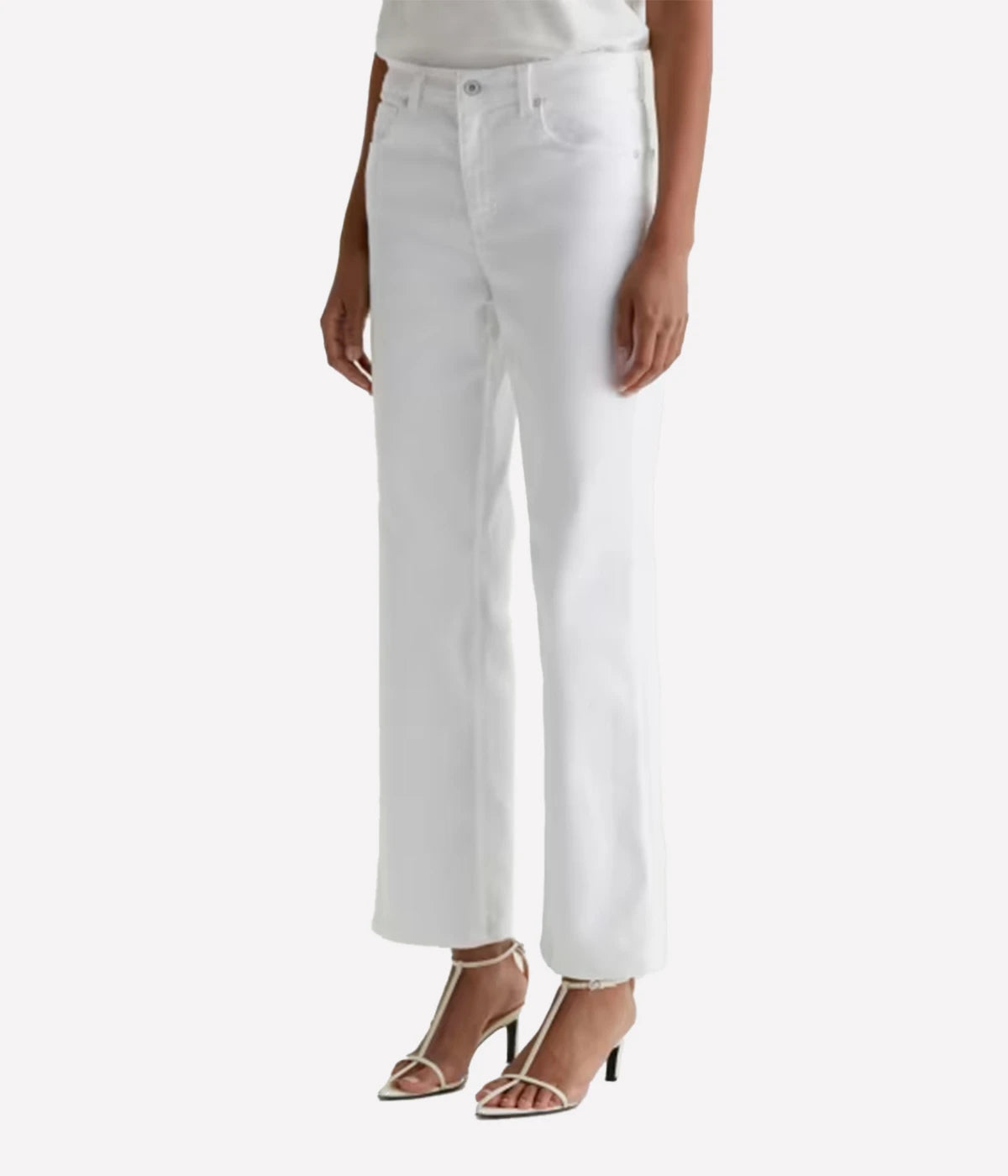 White jeans worn by a person on a white background