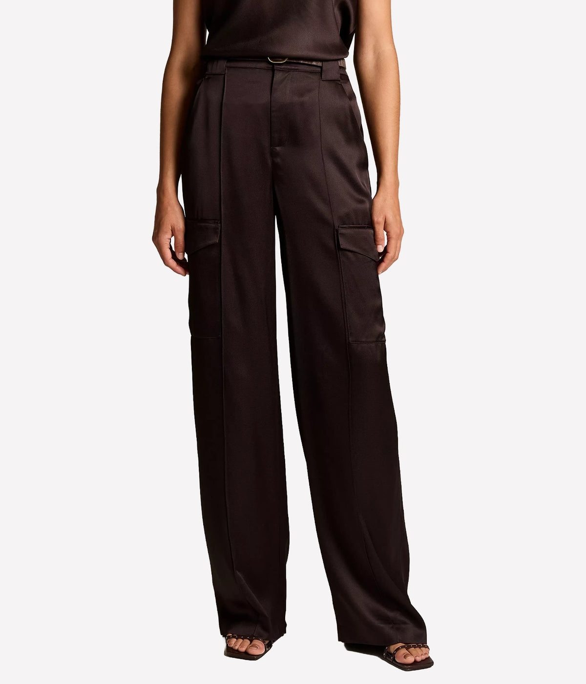 Front view of a model wearing the Vince High Waisted Trouser In Cinderwood with a thin black belt and a matching tucked-in top, showing the front pleats, cargo pockets and wide straight leg