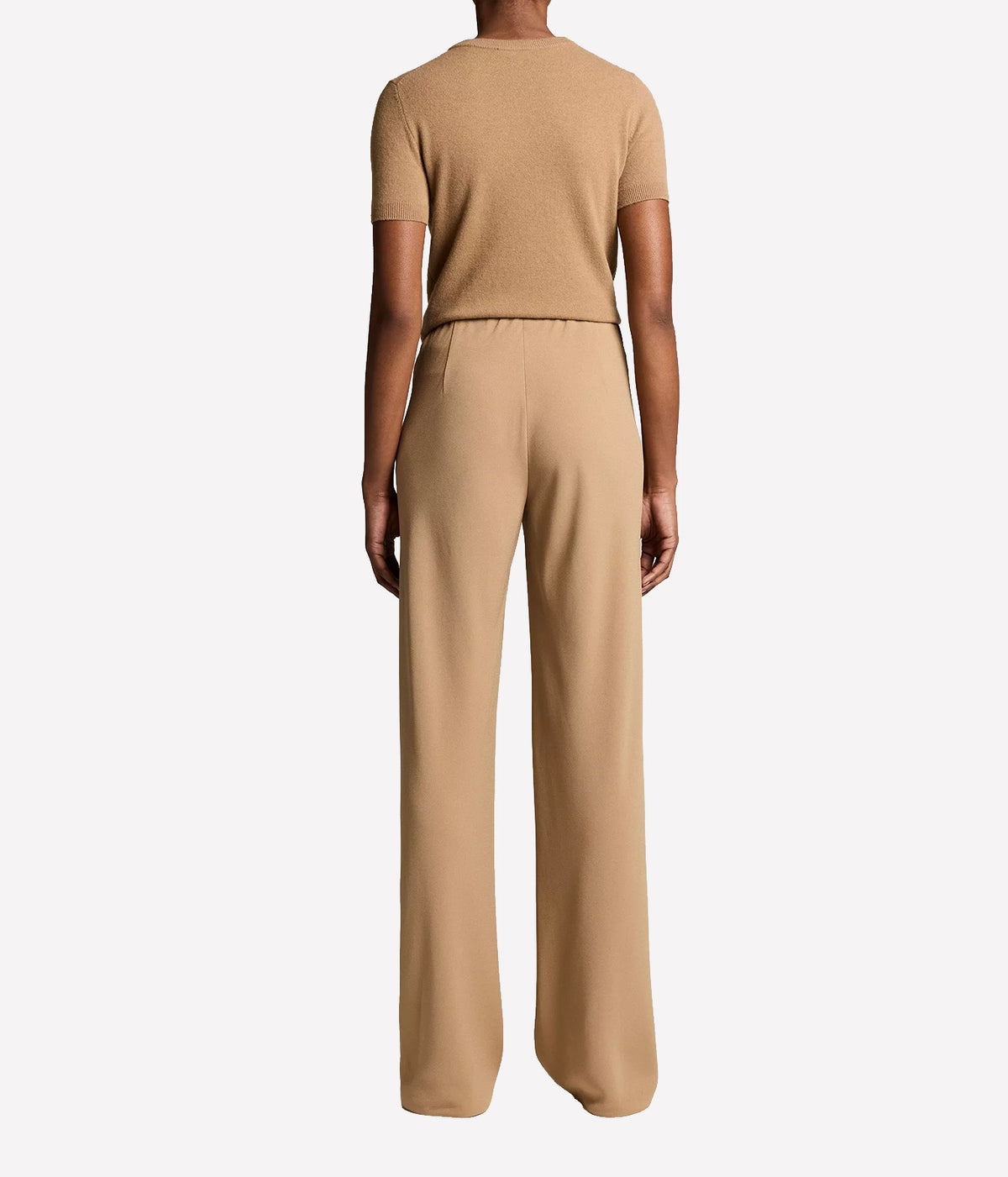 Back view of a model wearing the Vince Colette High Waist Pant In Carmello with a matching short-sleeve top