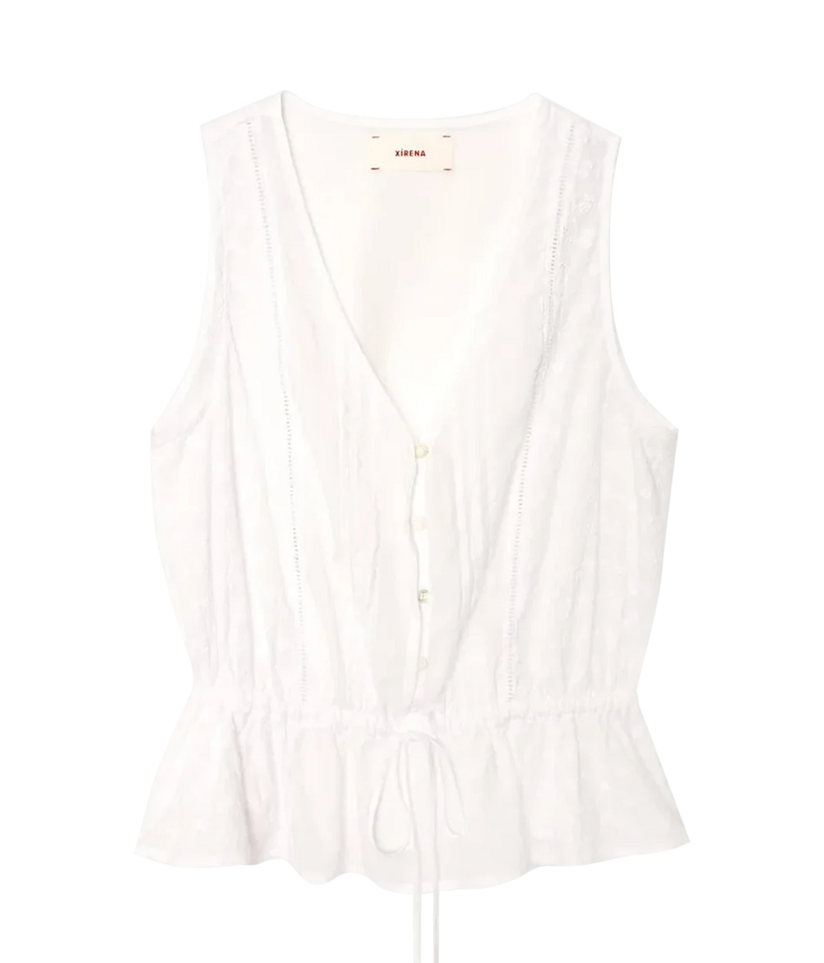 Xirena Emma Top in Blanc laid flat, showing the V-neckline, partial button front, lace inset panels and tie drawstring waist above the ruffled peplum hem