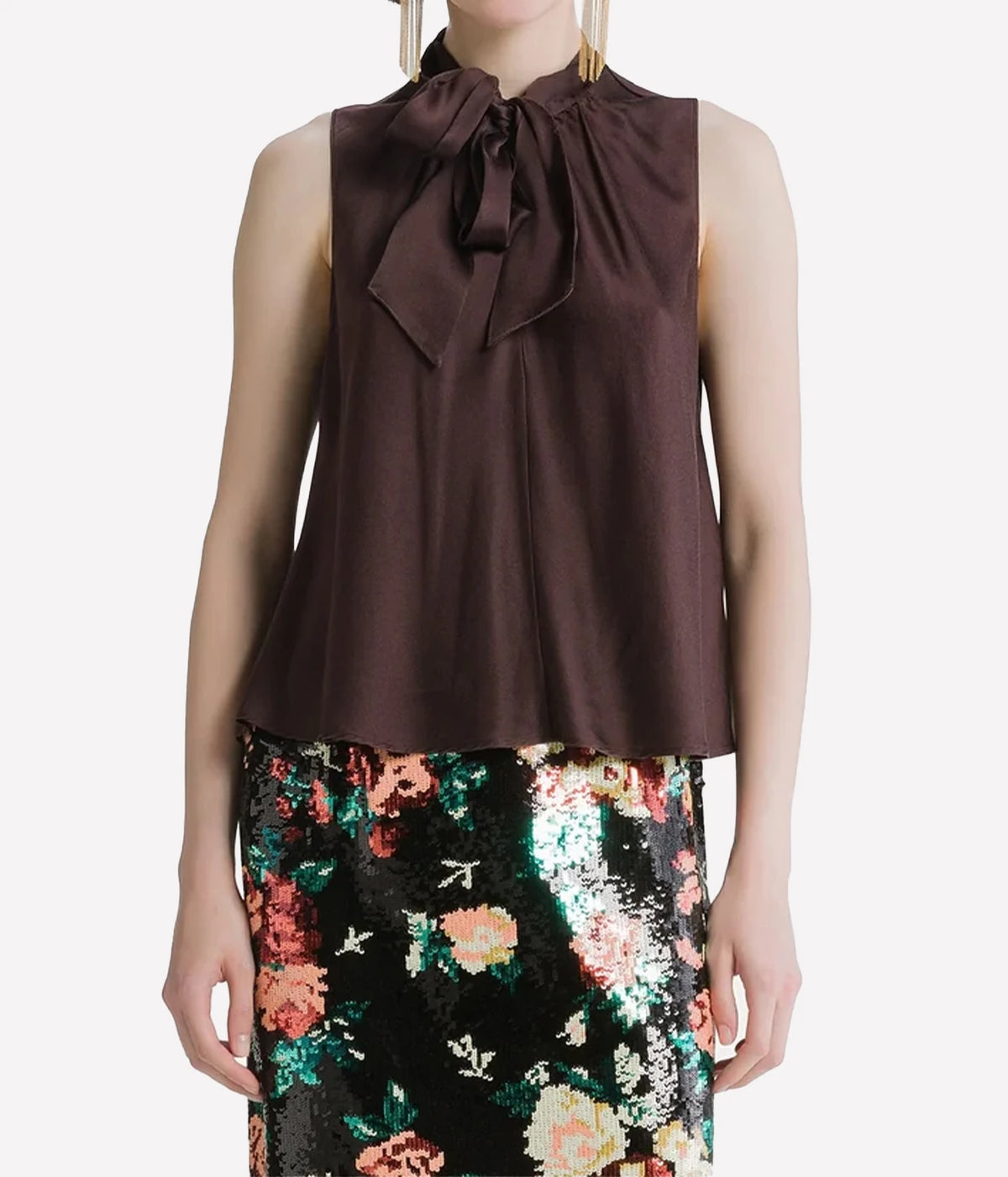 Woman wearing the Forte Forte silk satin sash top in Fondant with a black floral print skirt, front view.