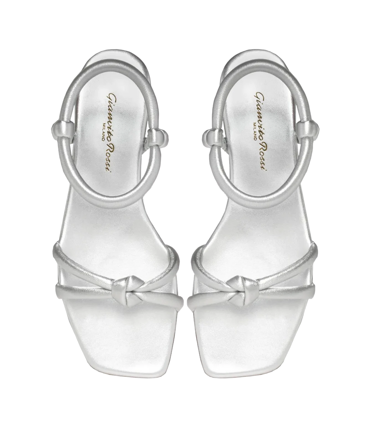 Top-down view of a pair of Gianvito Rossi Juno 05 Nappa in Silver, showing the square toes, knotted straps and silver leather footbeds