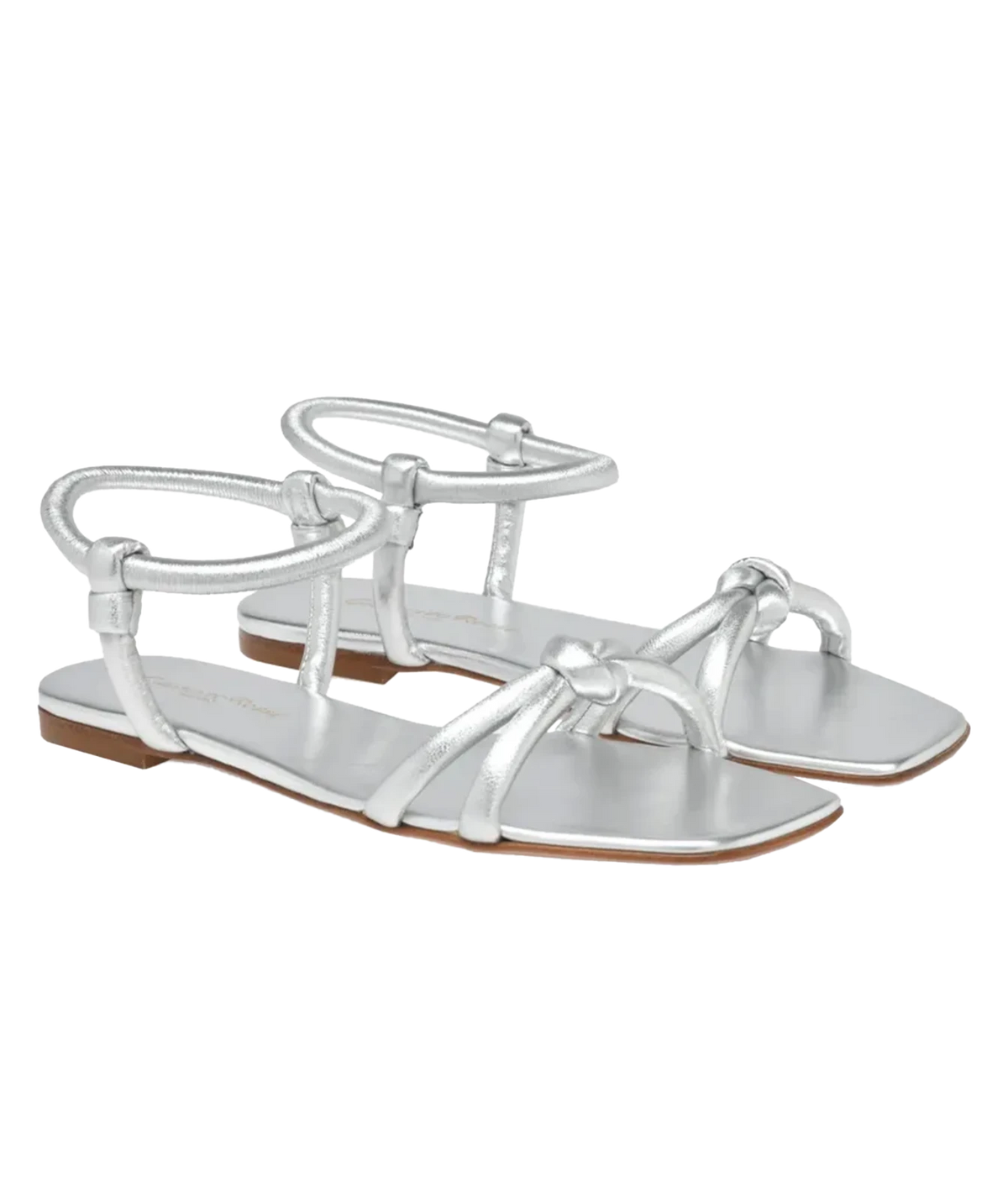 Pair of Gianvito Rossi Juno 05 Nappa in Silver angled from the side, showing the knotted crossover straps and buckled ankle straps