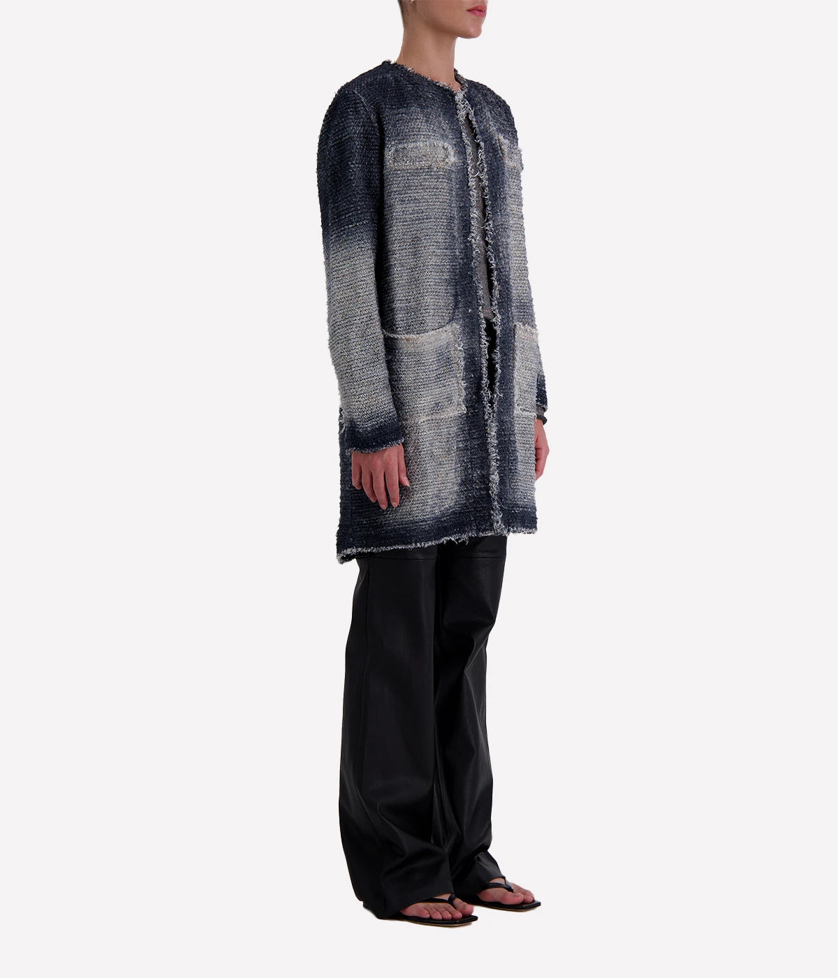Women’s longline open-front jacket featuring a hand-painted finish, contrast stitching, side pockets, and a soft lining—ideal for transseasonal wear.