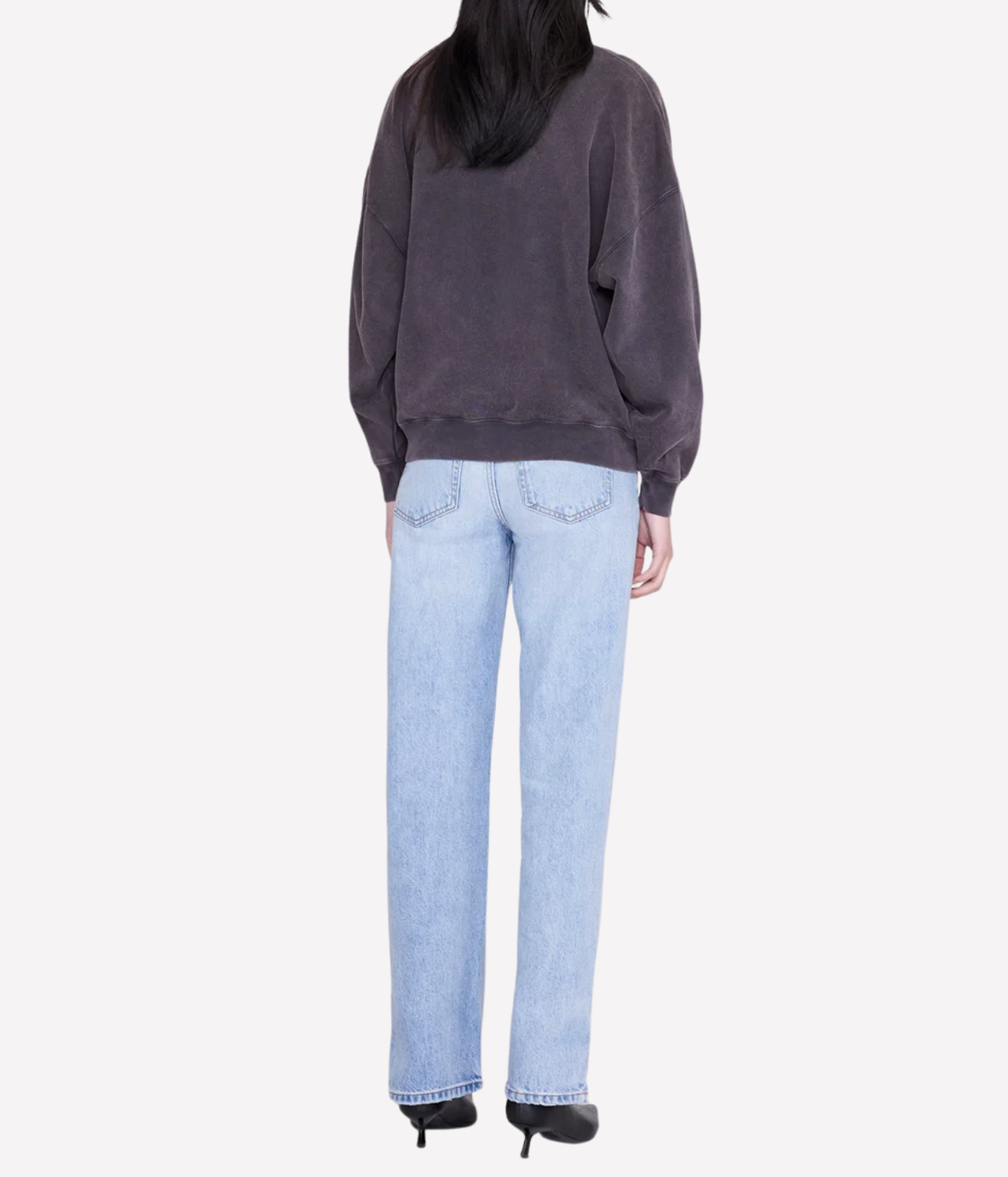 Anine Bing Miles Sweatshirt Tiger Bing In Black - image of model from back with long blue denim jeans