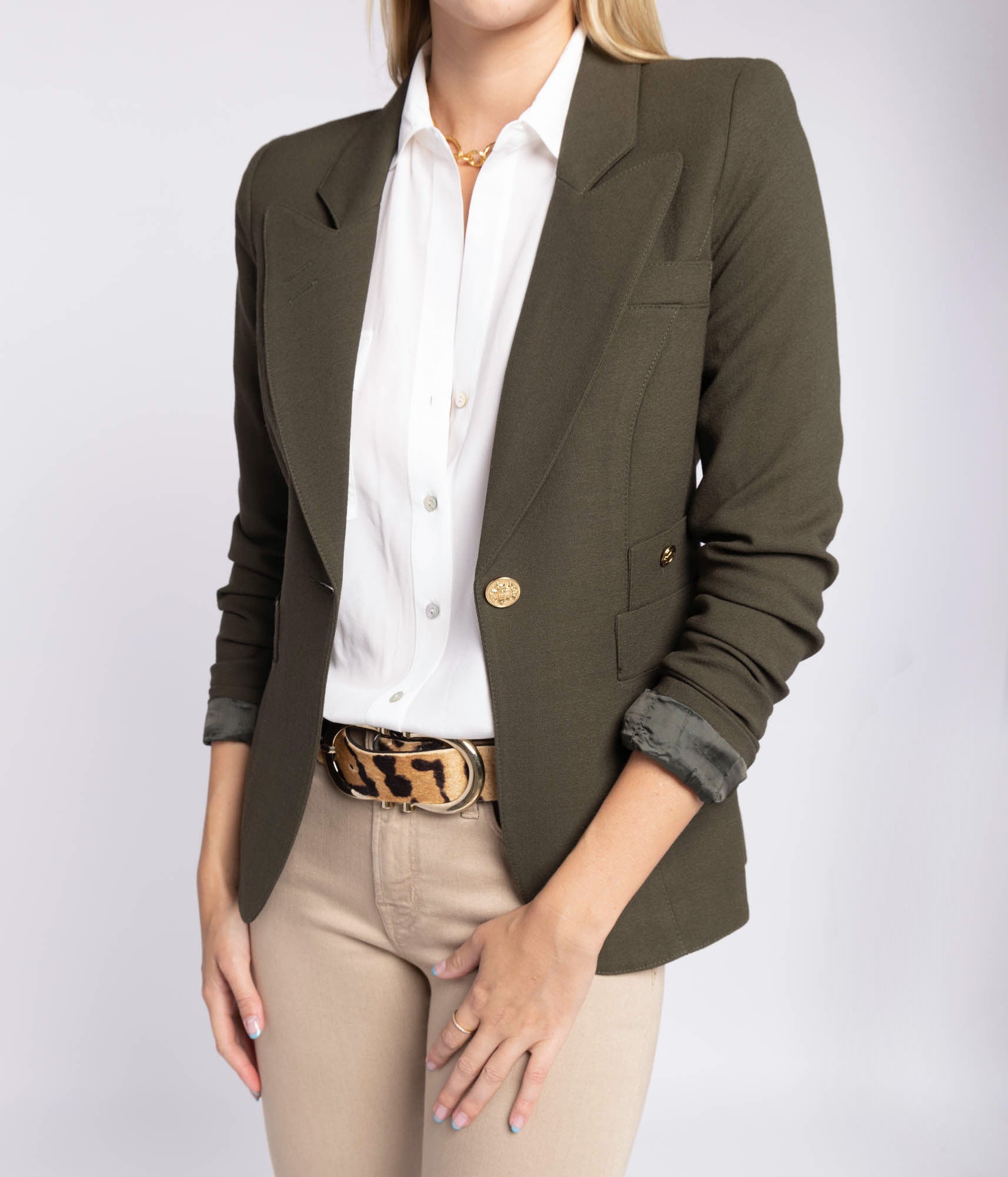 ALT text: Smythe Classic Duchess Blazer in wool with brass buttons and cut-out back detail, a Calexico staple worn by Kate Middleton