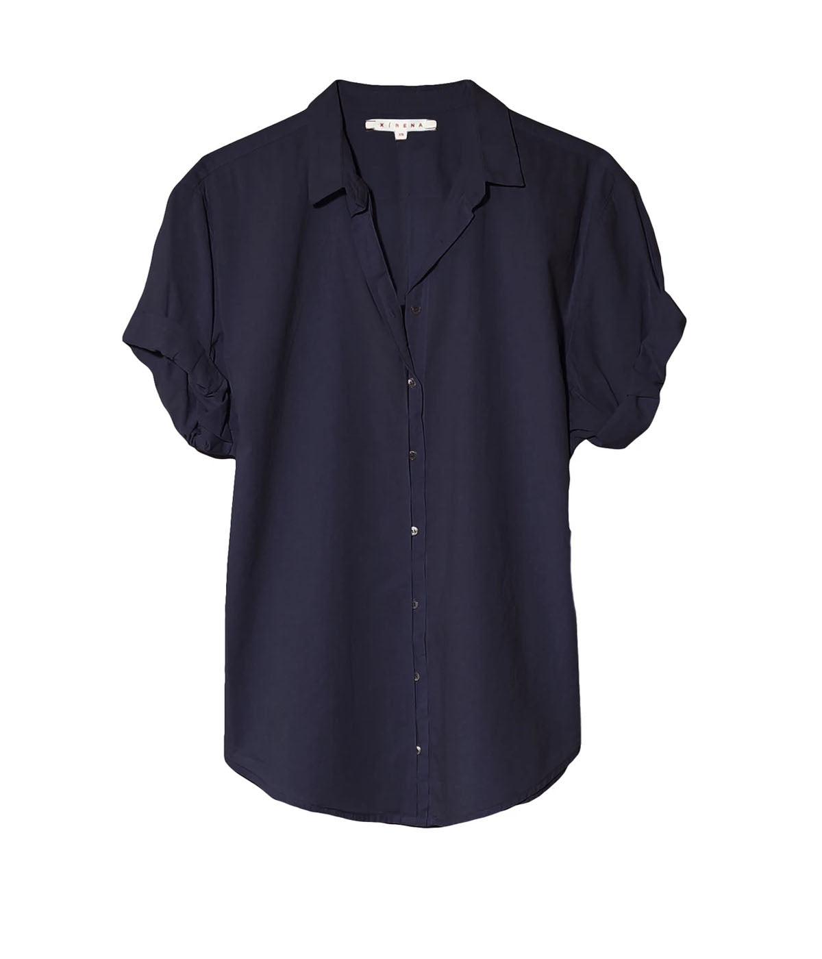 Lightweight feminine button-down blouse with petit collars and rolled sleeves, made from 100% cotton in a relaxed fit