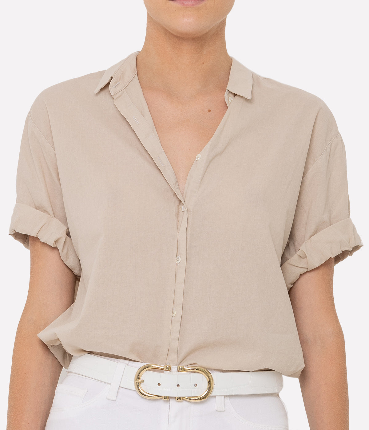 Feminine lightweight button-down blouse with petit collars and rolled sleeves, crafted from 100% cotton for a breathable, effortless fit