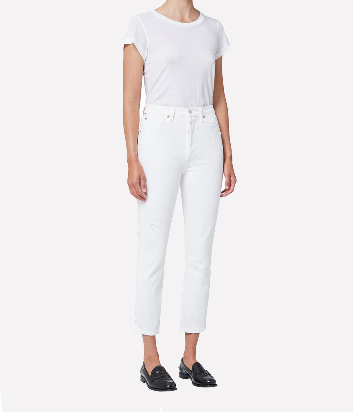 ALT Text: Citizens of Humanity Jolene Jean in clean white denim with subtle distressing, high-rise fit, and slim-leg silhouette. Perfect for versatile styling.