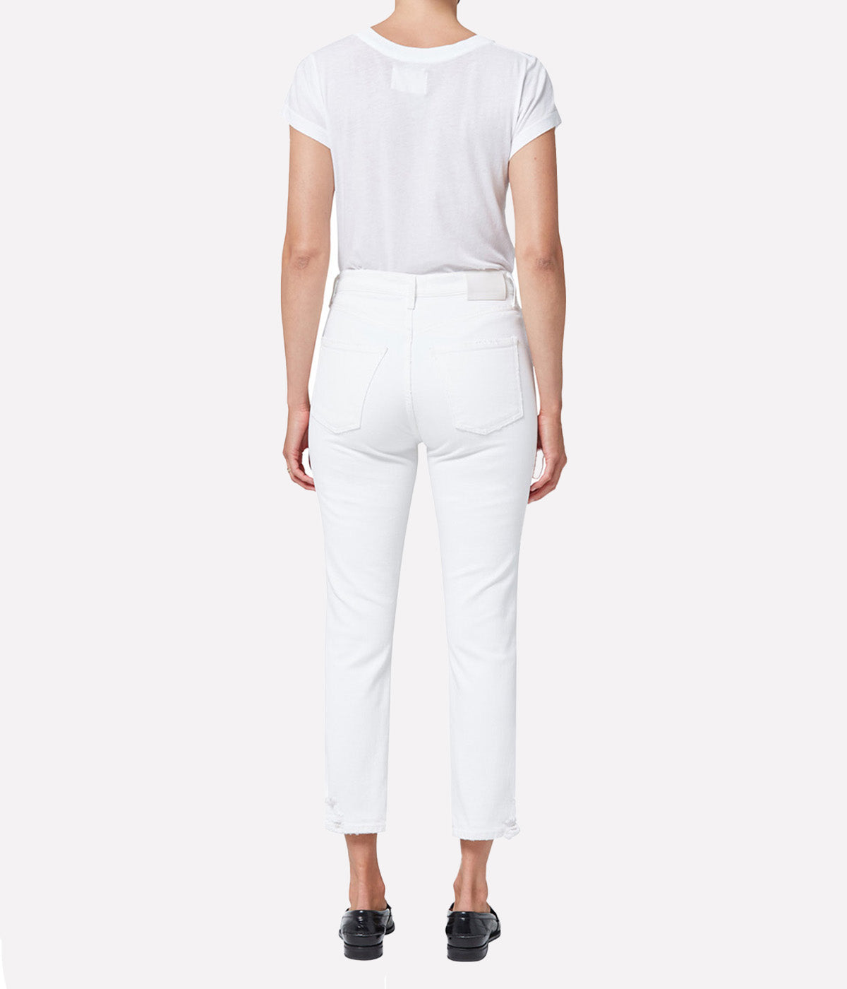 ALT Text: Citizens of Humanity Jolene Jean in clean white denim with subtle distressing, high-rise fit, and slim-leg silhouette. Perfect for versatile styling.