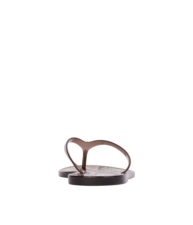 A pair of dark brown heart-shaped thong sandals with a glossy finish