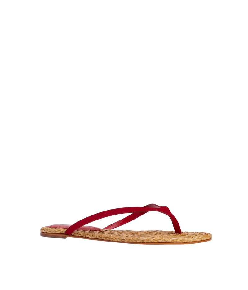 A single red leather thong sandal with a woven natural sole - Alaya Sandal in Cherry Suede