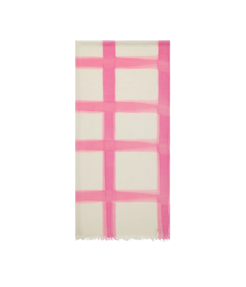 A cream-colored scarf with a pink grid pattern and fringed edges, displayed flat against a solid white background.