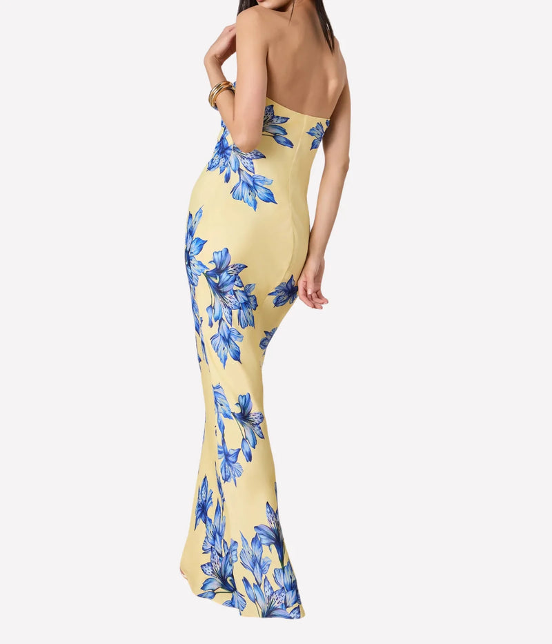 Yellow floral dress with blue flowers on a white background