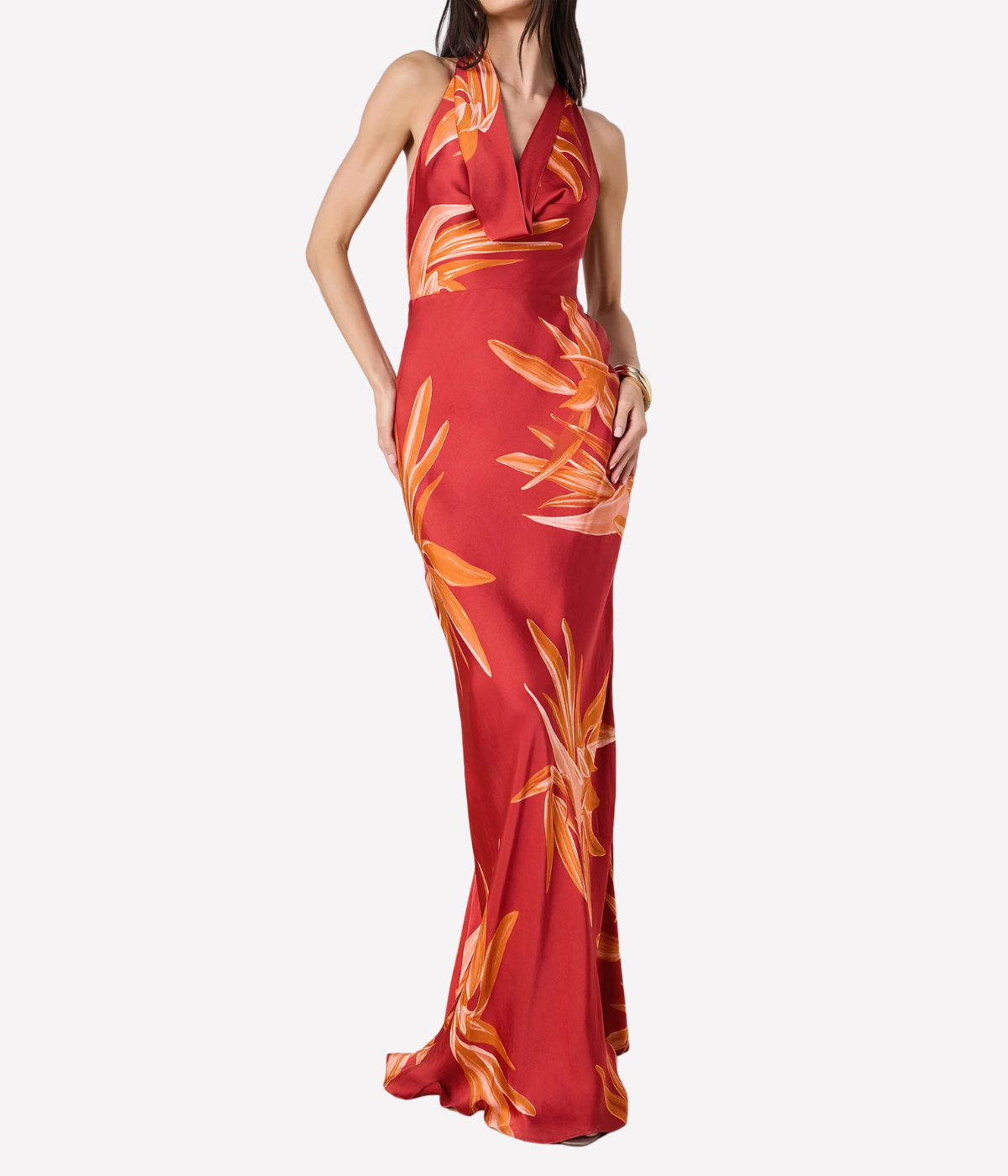 Red evening gown with orange floral pattern on a white background