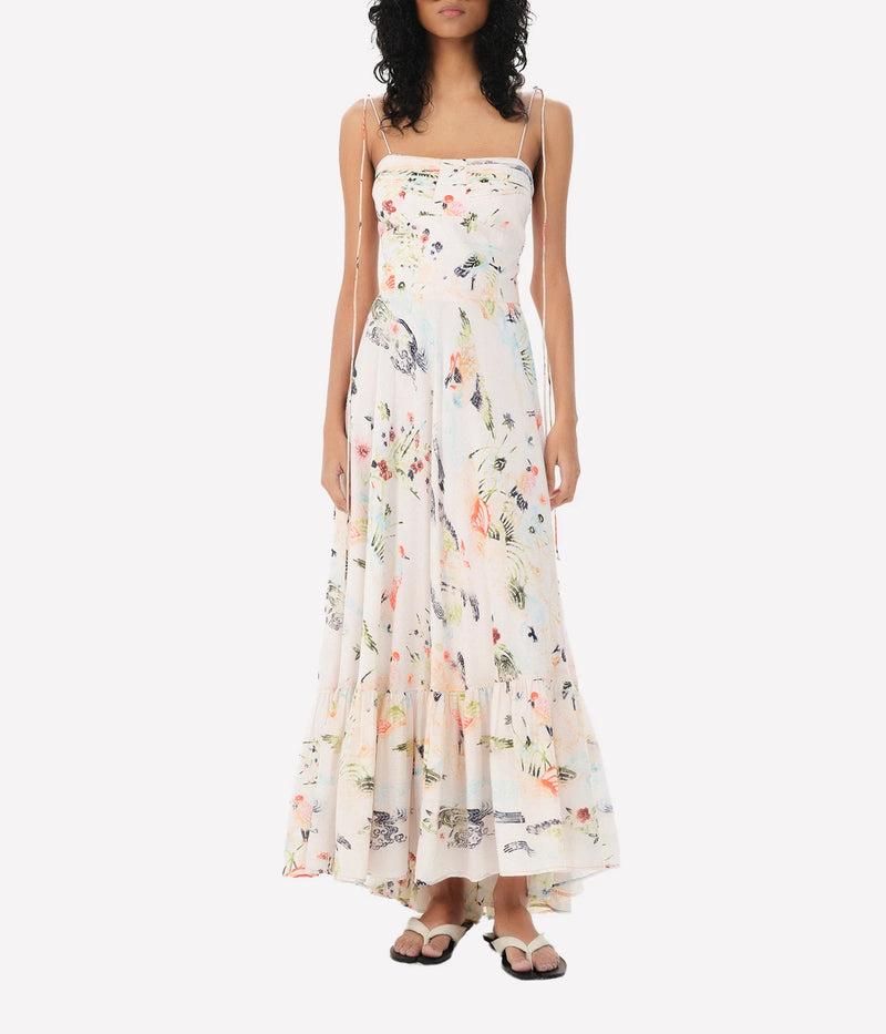 ALT text: Sky-blue floral maxi dress with a square neckline and spaghetti straps.