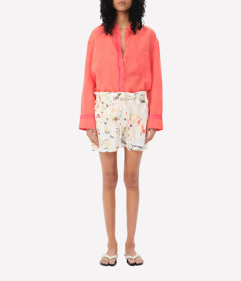 ALT text: High-waisted printed shorts with an elastic waistband and patch pockets.
