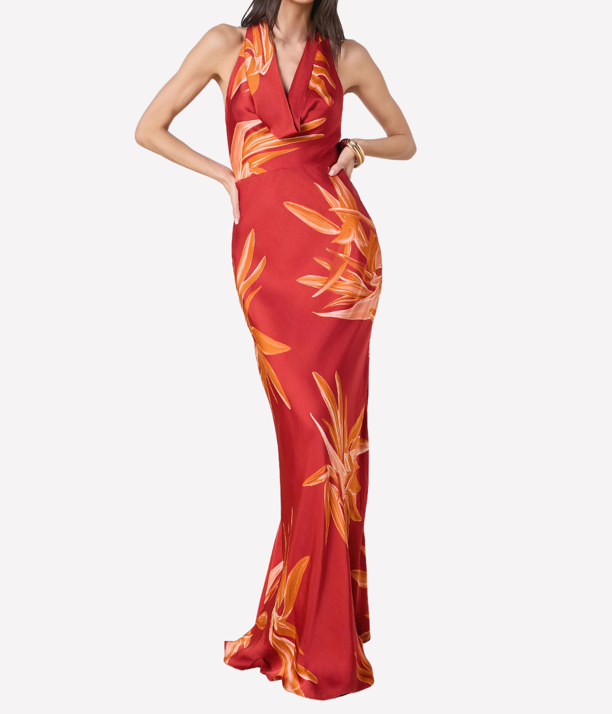 Red evening gown with orange floral pattern on a white background
