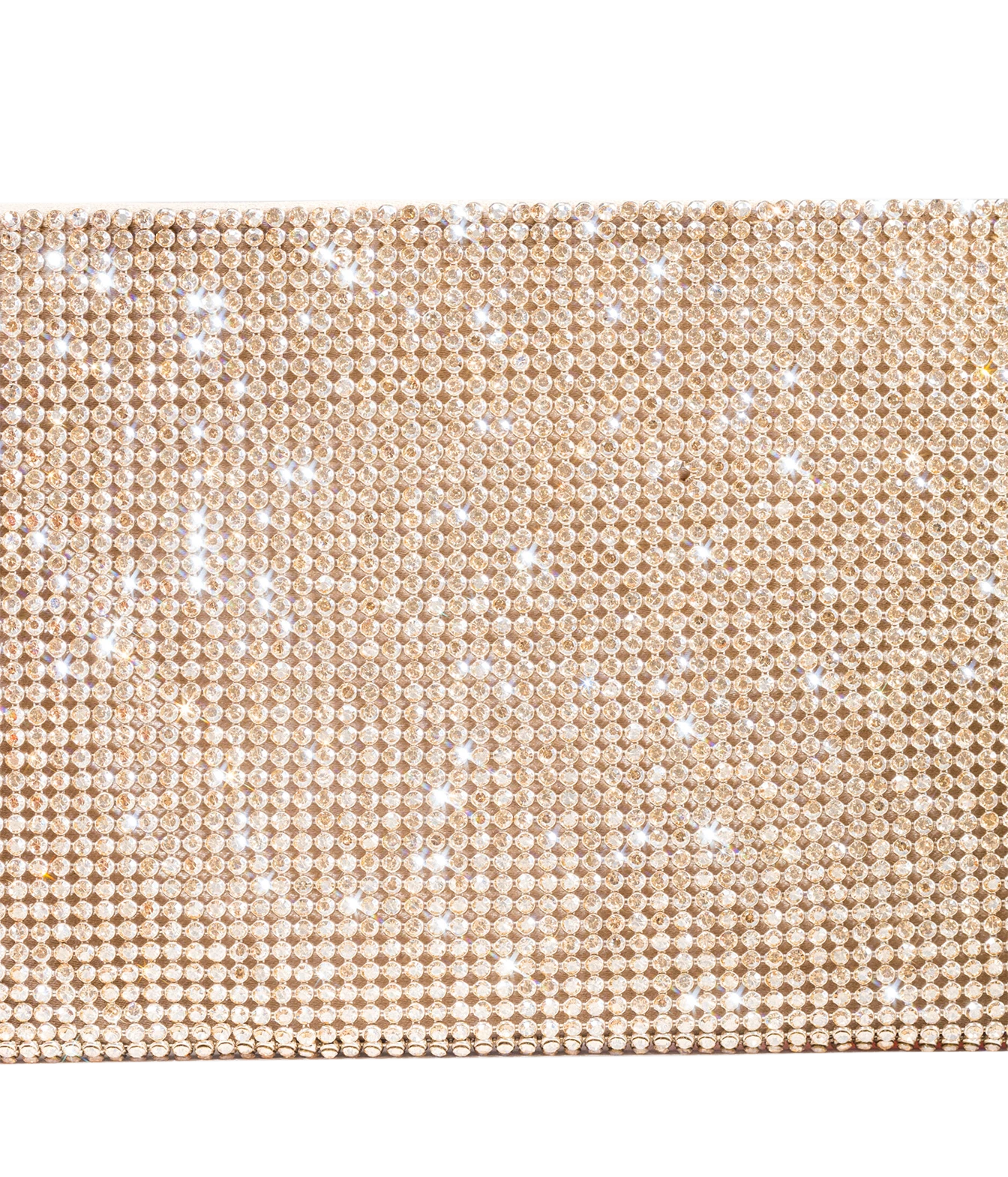 A close-up of a champagne gold rhinestone-embellished clutch or pouch, showing the sparkling texture against a white background.