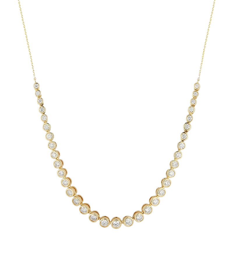 Dana Rebecca Designs Lulu Jack Graduating Bezel Tennis Necklace in 14k Yellow Gold laid flat, showing bezel-set diamonds that increase in size towards the centre