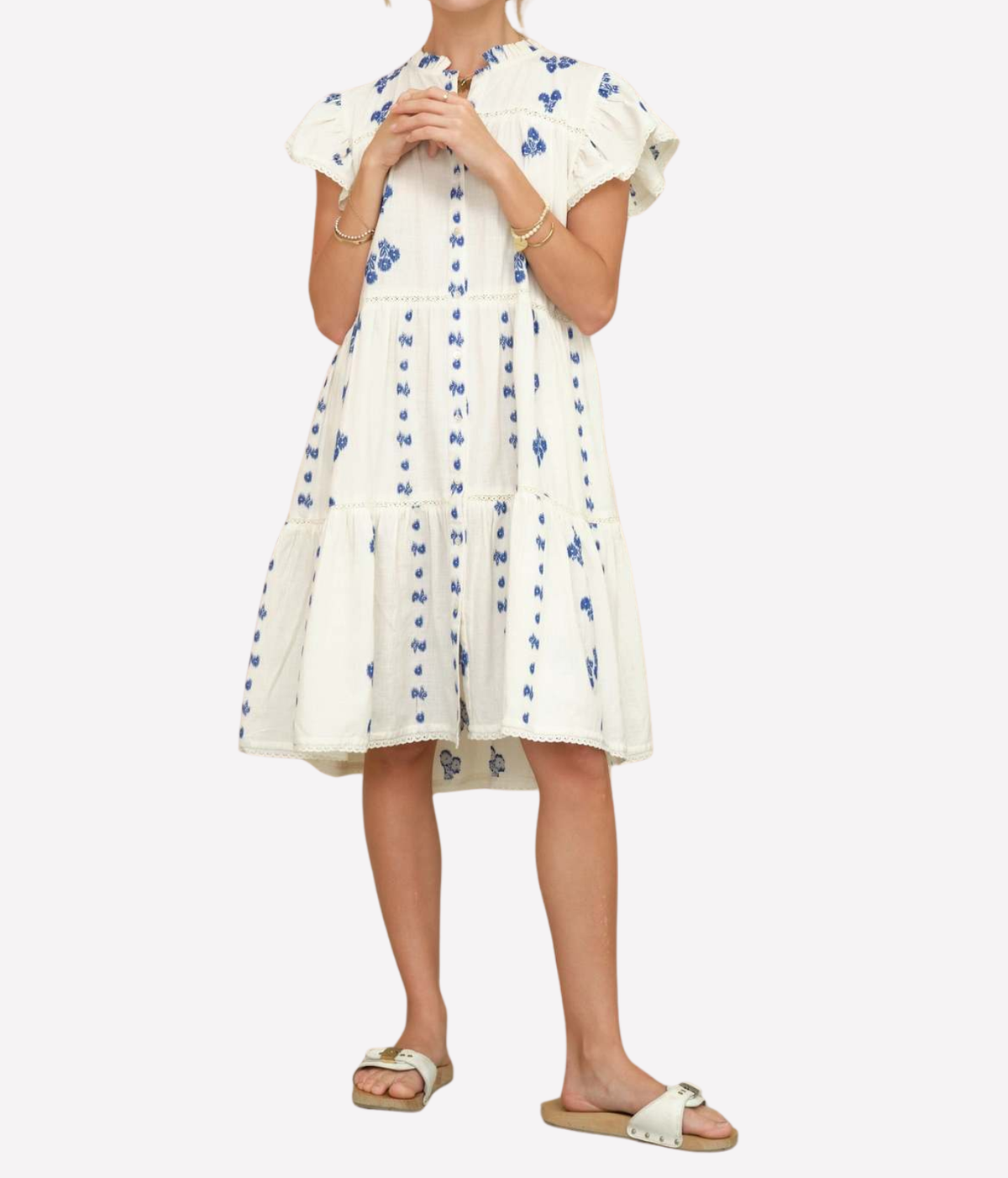 Model wearing the M.A.B.E Iris Woven Frill Short Dress in Blue – front view