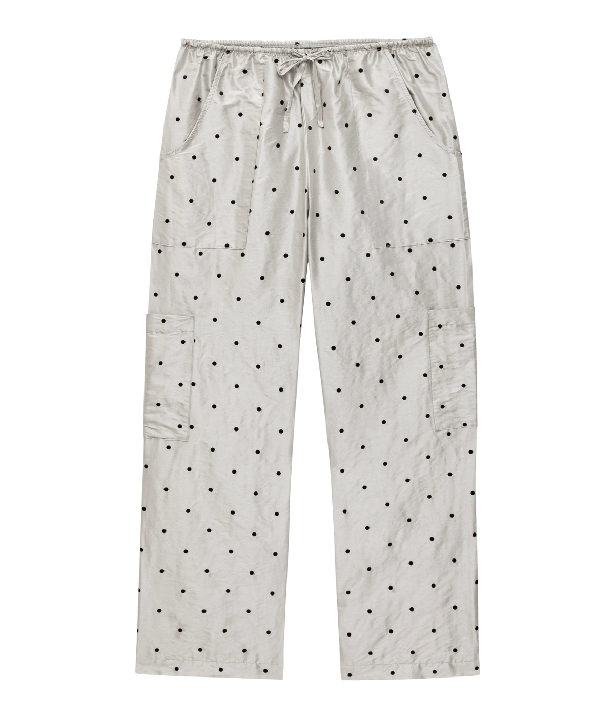 DONNI. The Silk Taffeta Cargo Pant in Silver Polka Dot laid flat, showing the black polka dot print, drawstring waist, slant front pockets and patch cargo pockets on both legs