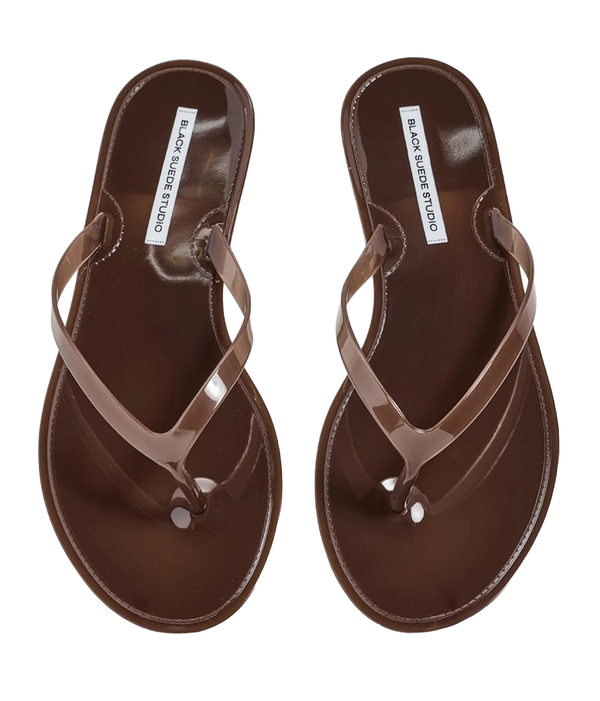 A pair of glossy brown jelly sandals with matching brown straps, shown from a top-down view - Crystal Sandal in Chestnut