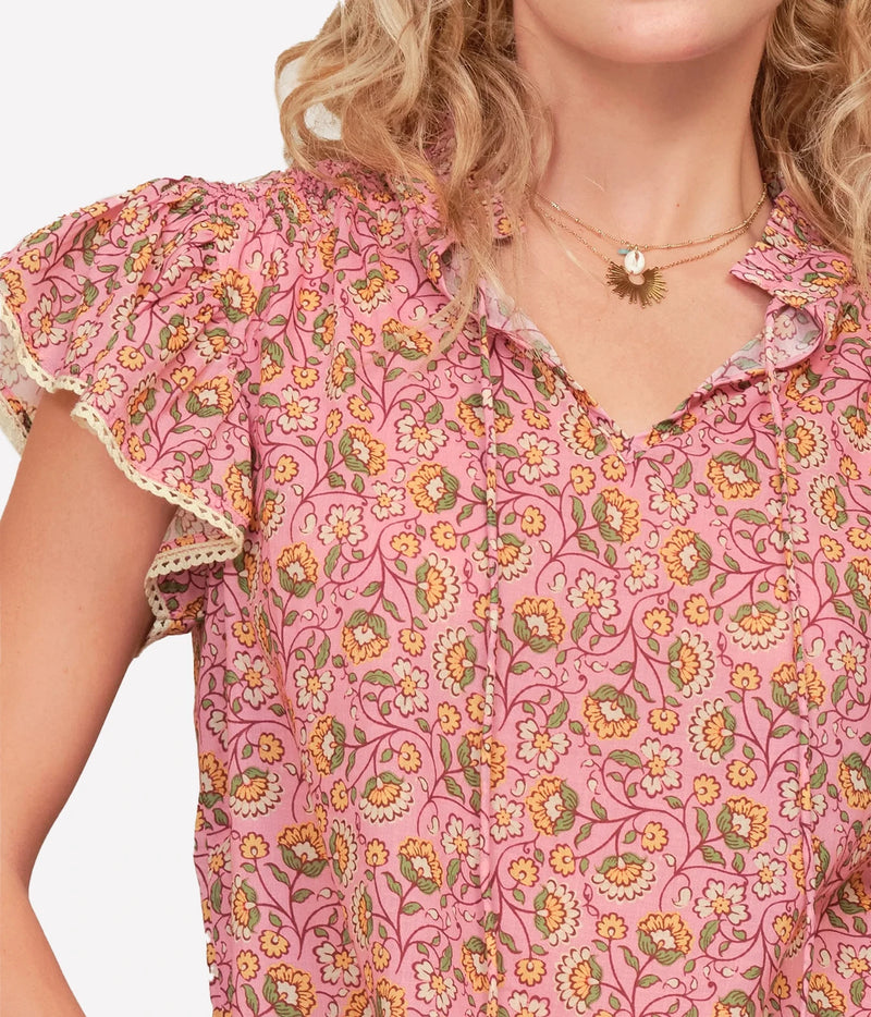 M.A.B.E Ceci Print Short Sleeve Top in Pink – close-up of floral print and frill sleeve