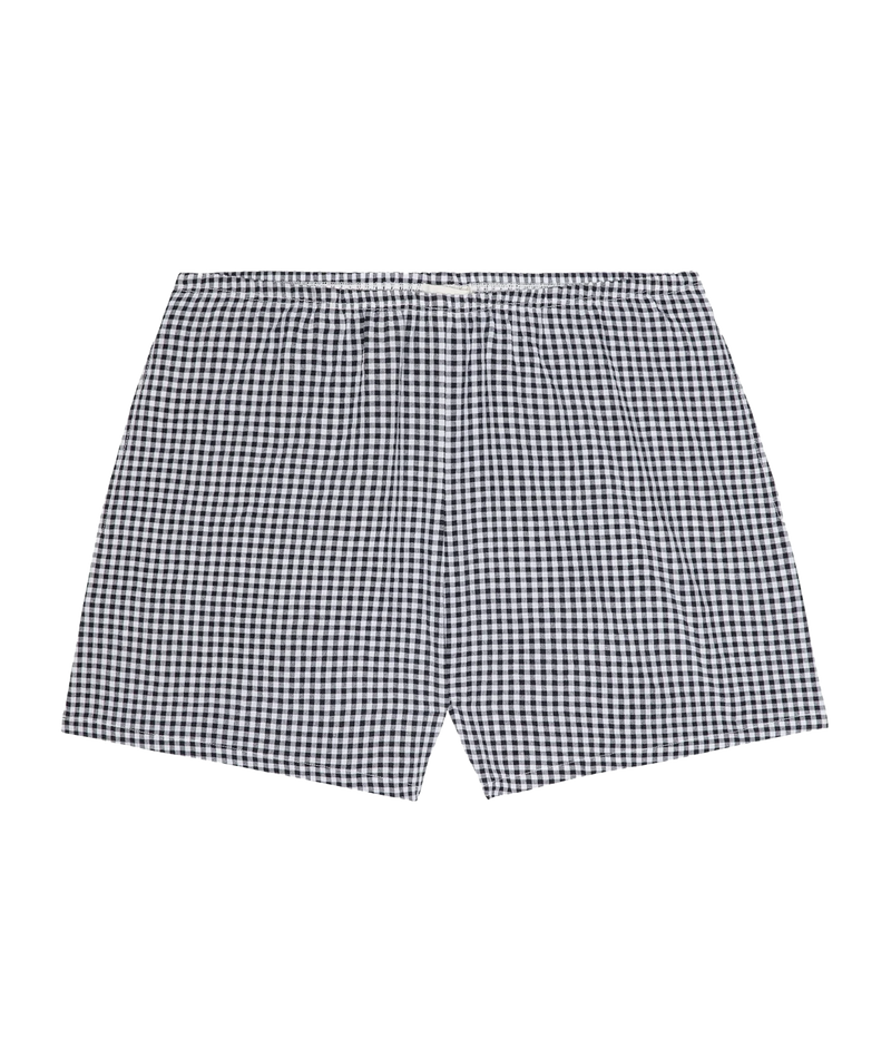 Black and white gingham check boxer shorts on a solid white background.