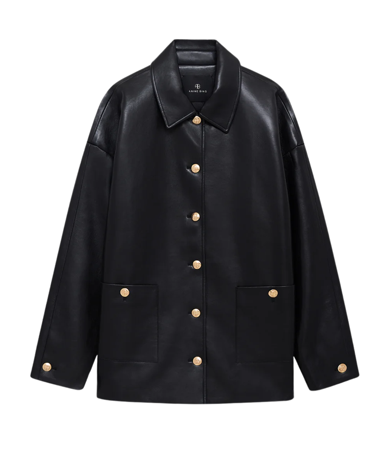 A black faux leather jacket with gold-tone buttons, a pointed collar, and two front patch pockets, shown against a plain white background.