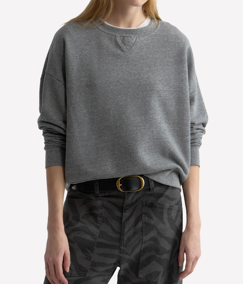 Nili Lotan Gladys Sweatshirt in Heather Grey worn on model, upper body front view of oversized crewneck sweatshirt with dropped shoulders and relaxed silhouette.