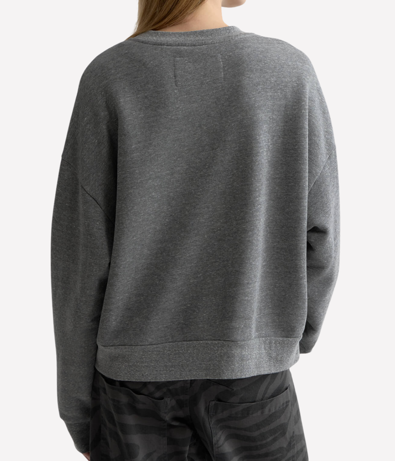 Nili Lotan Gladys Sweatshirt in Heather Grey worn on model, upper body back view showing oversized silhouette, soft drape, and medium-length relaxed fit.