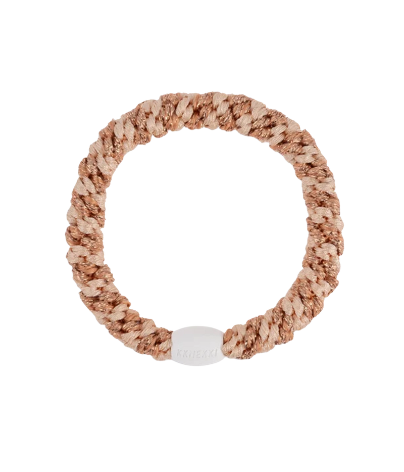 A multi coloured beige braided hair band with a smooth plastic bead with KKNEKKI writing