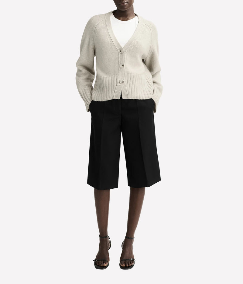 Chunky knit v-neck cashmere cardigan by Soft Goat in a relaxed fit with button-down front – luxury women’s knitwear.