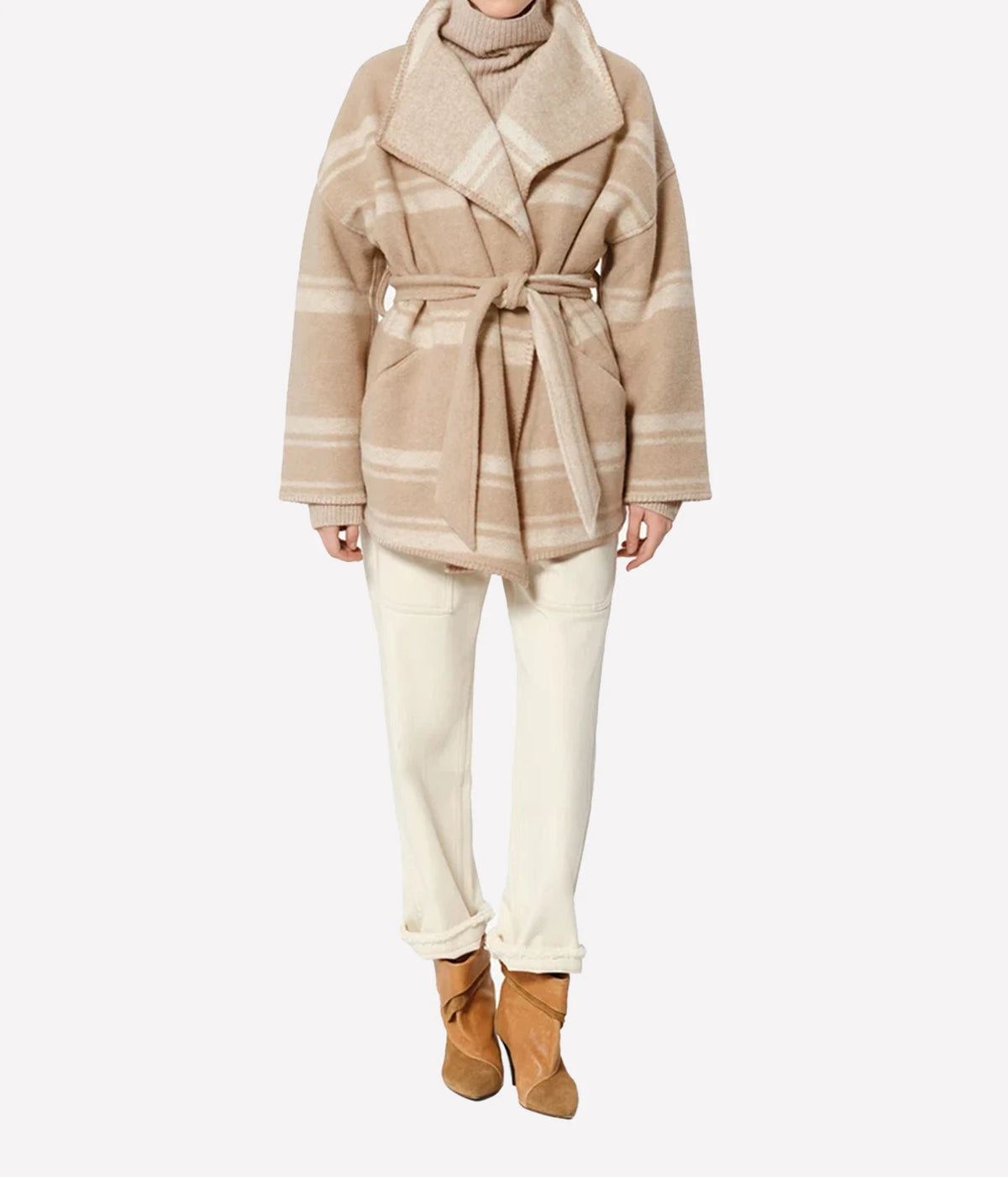 Isabel Marant Brea Belted Checked Coat - A model wearing a beige and cream plaid belted coat, cream trousers, and tan ankle boots.