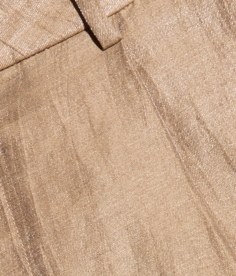 Close-up of the Latte & Gold linen-blend fabric, showing its crinkled texture, subtle metallic sheen and pocket seam.