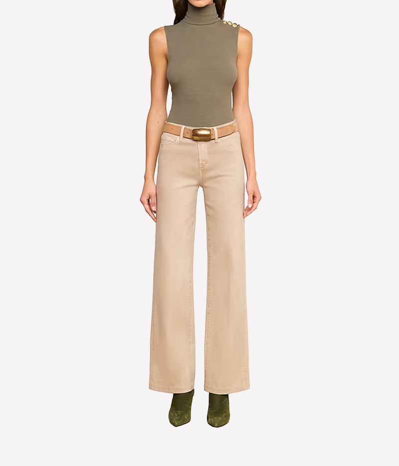 Front view of the L’AGENCE Scottie Coated Wide-Leg Jeans in Antique Birch, styled with a tan belt, olive top and suede boots.