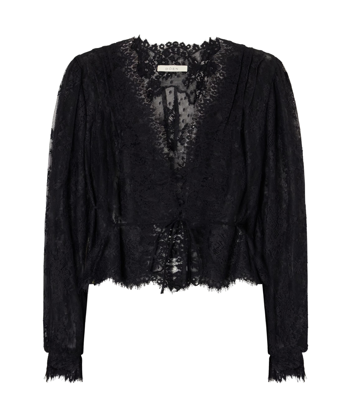DÔEN Amaline Top In Black laid flat, showing the sheer floral lace, scalloped eyelash-lace V-neckline, pleated shoulders, tie waist, peplum hem and long sleeves with lace cuffs