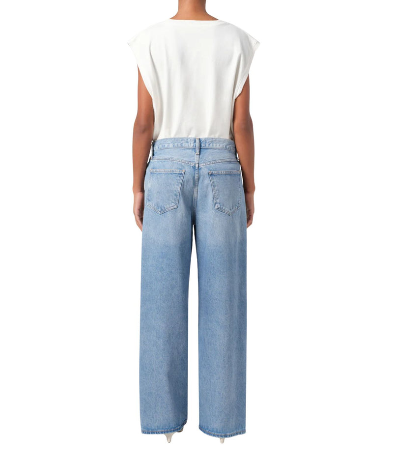 A pair of low-slung baggy jeans in organic cotton, featuring a relaxed fit that sits low on the hips. The jeans have a baggy straight leg, a longer inseam, and a soft, worn-in look. 