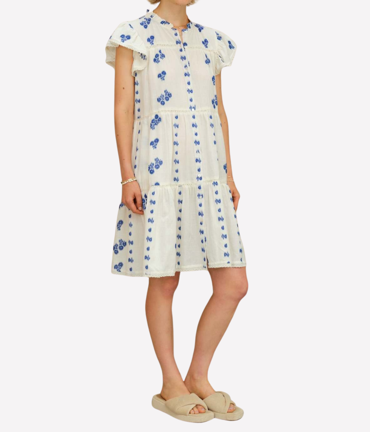 Model wearing the M.A.B.E Iris Woven Frill Short Dress in Blue – relaxed front view