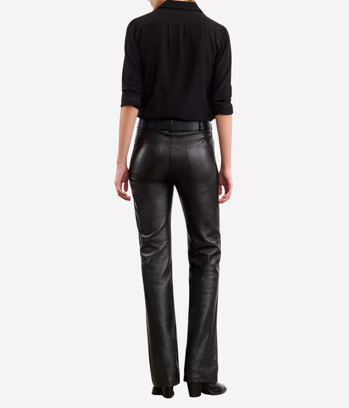 Nili Lotan Joan Leather Pant in Turkish Lambskin, full length back view on model showing slim straight-leg silhouette, fitted waist, and clean back tailoring with pocket detailing.