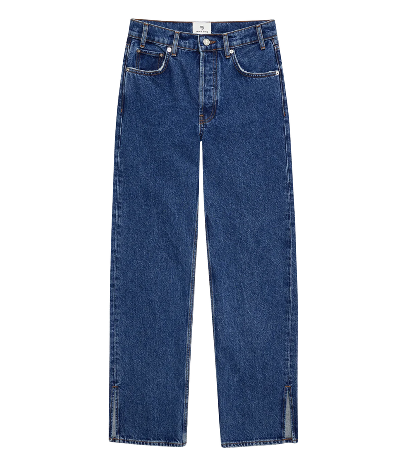A pair of dark blue denim jeans with a straight-leg fit, featuring a classic five-pocket design and subtle split detailing at the hems, shown flat against a solid white background.