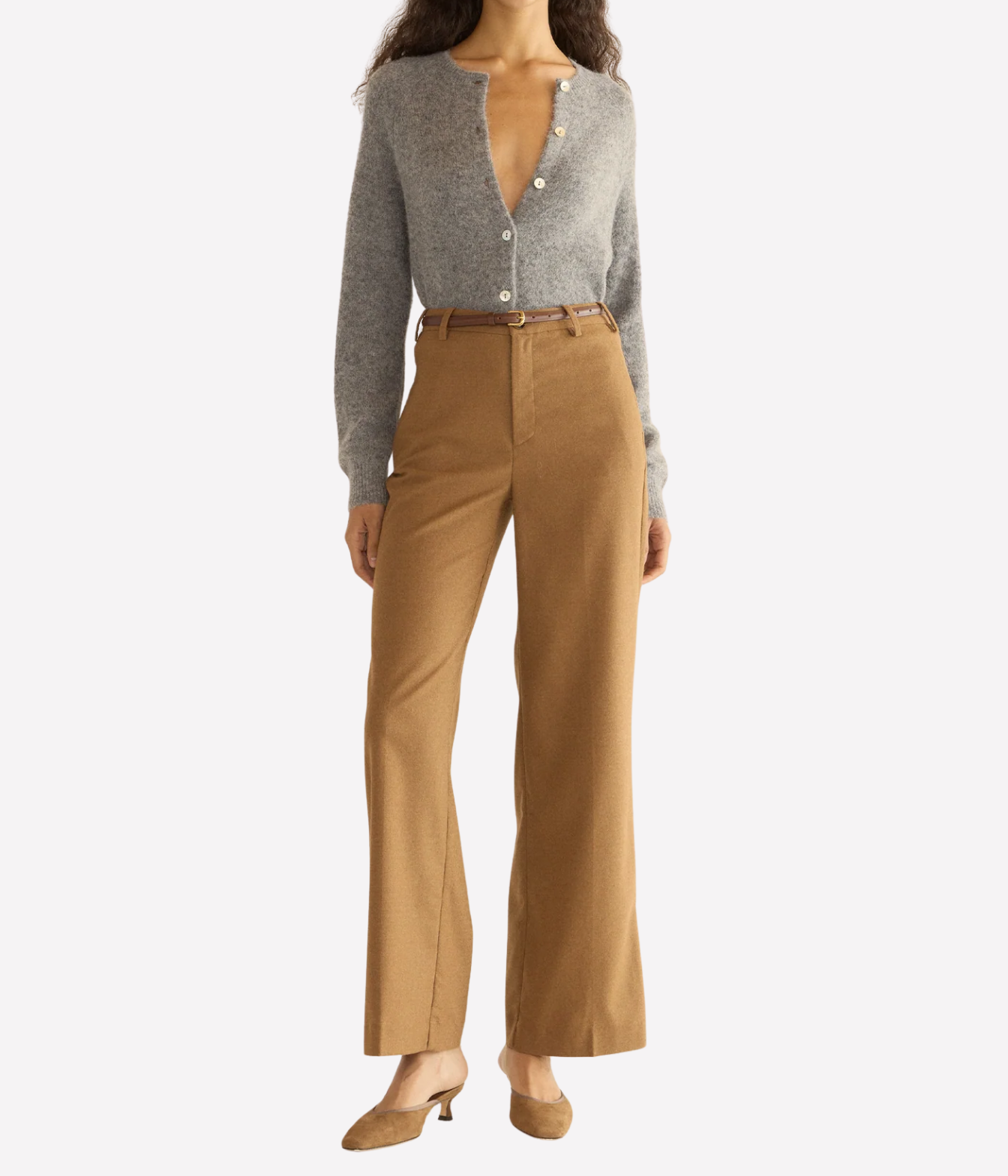 A woman wearing a grey knit cardigan with front buttons front view full length