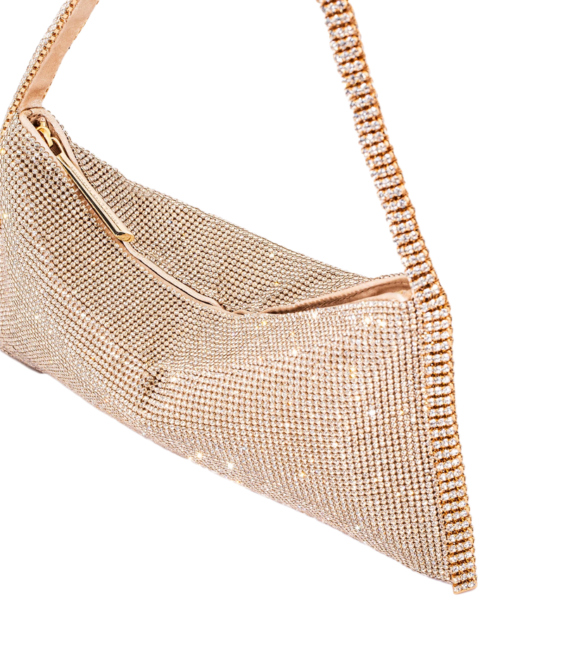 A close-up of a metallic rose gold evening clutch bag covered in sparkling rhinestones, featuring a gold-tone zipper and a matching rhinestone-embellished shoulder strap, set against a plain white background.