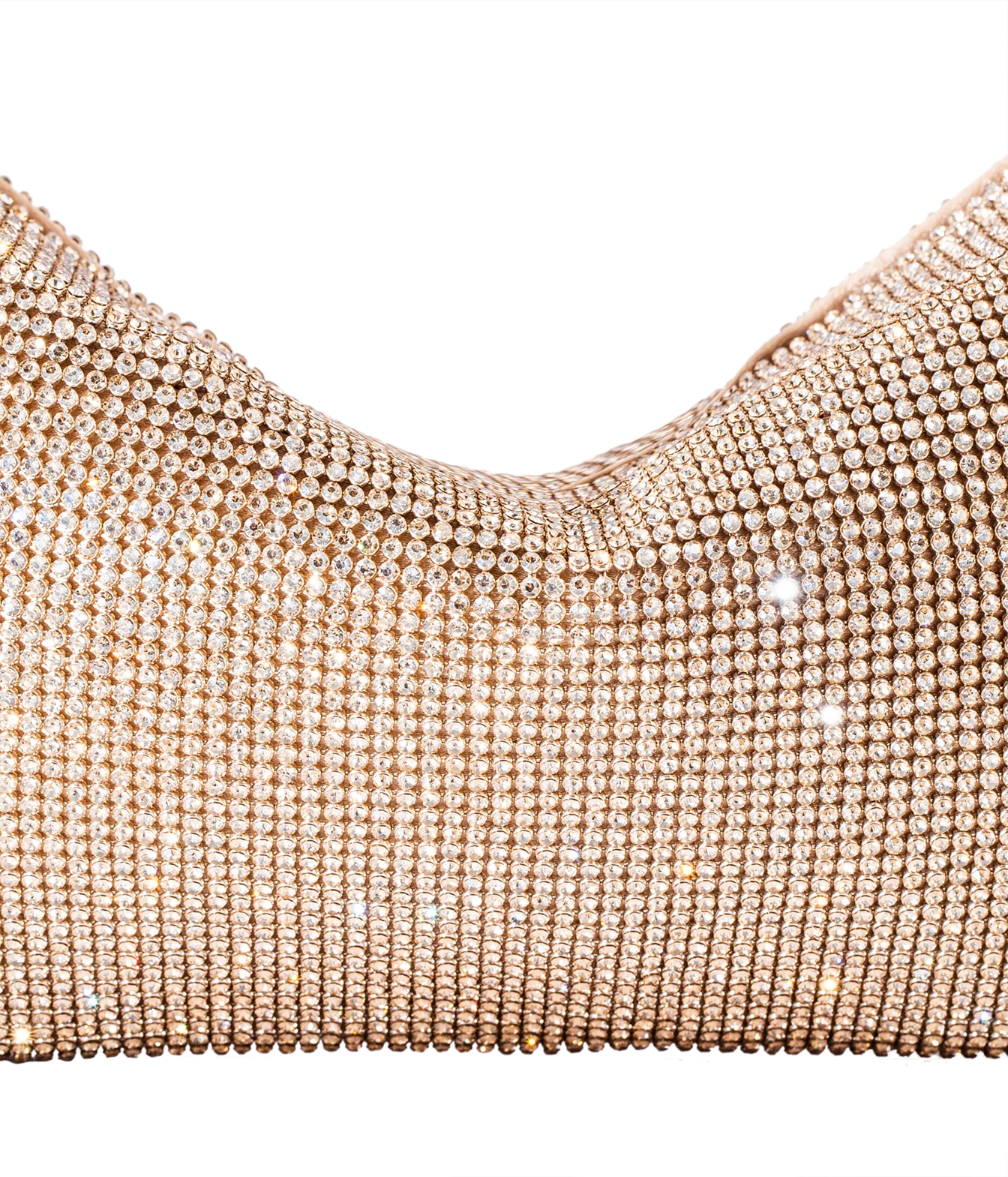 Close-up of a rose gold rhinestone mesh garment, showing the textured, shimmering surface against a plain white background.