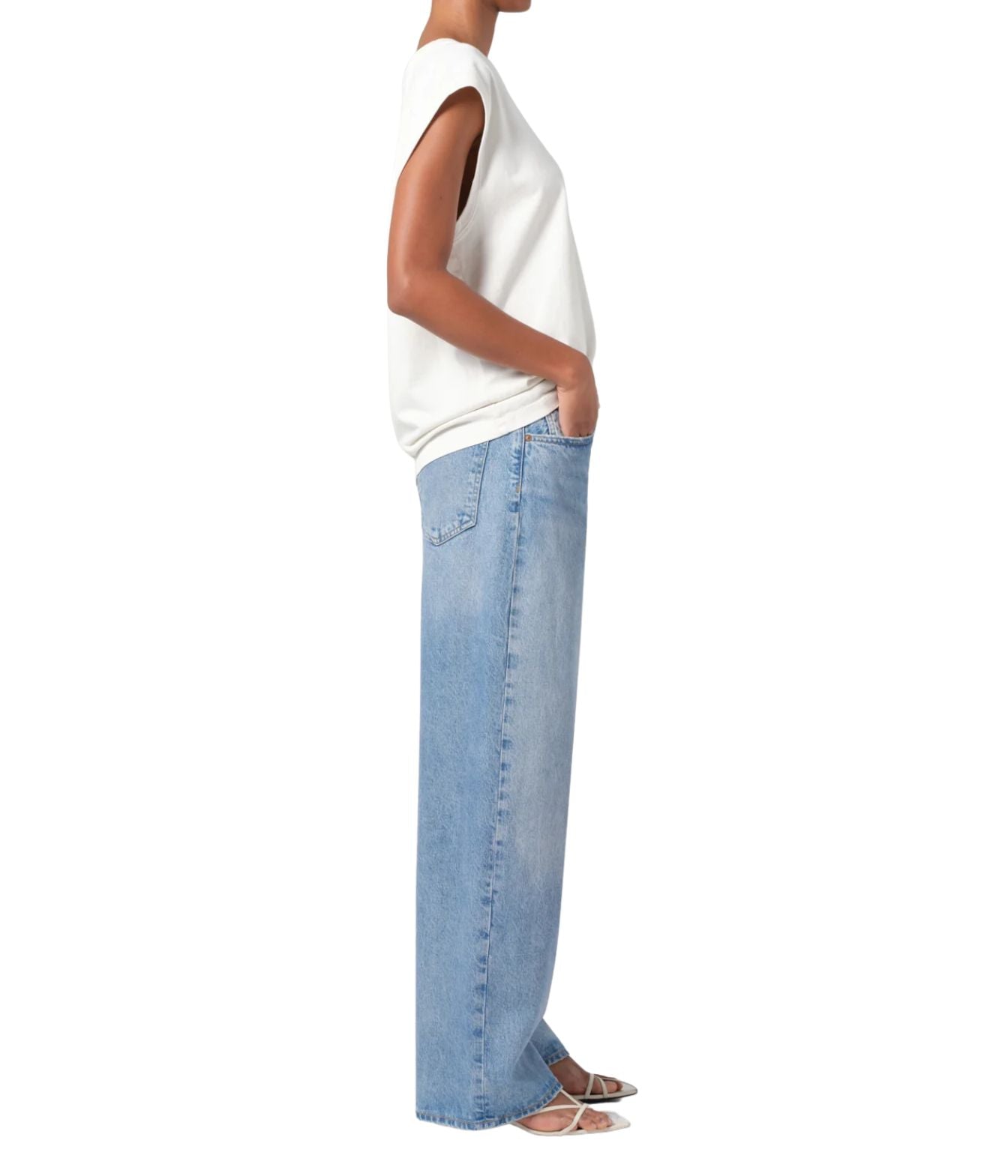 A pair of low-slung baggy jeans in organic cotton, featuring a relaxed fit that sits low on the hips. The jeans have a baggy straight leg, a longer inseam, and a soft, worn-in look. 