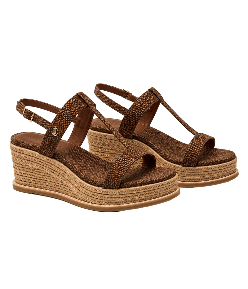 A pair of women's wedge sandals with brown woven straps and braided jute platform soles, shown against a plain white background.