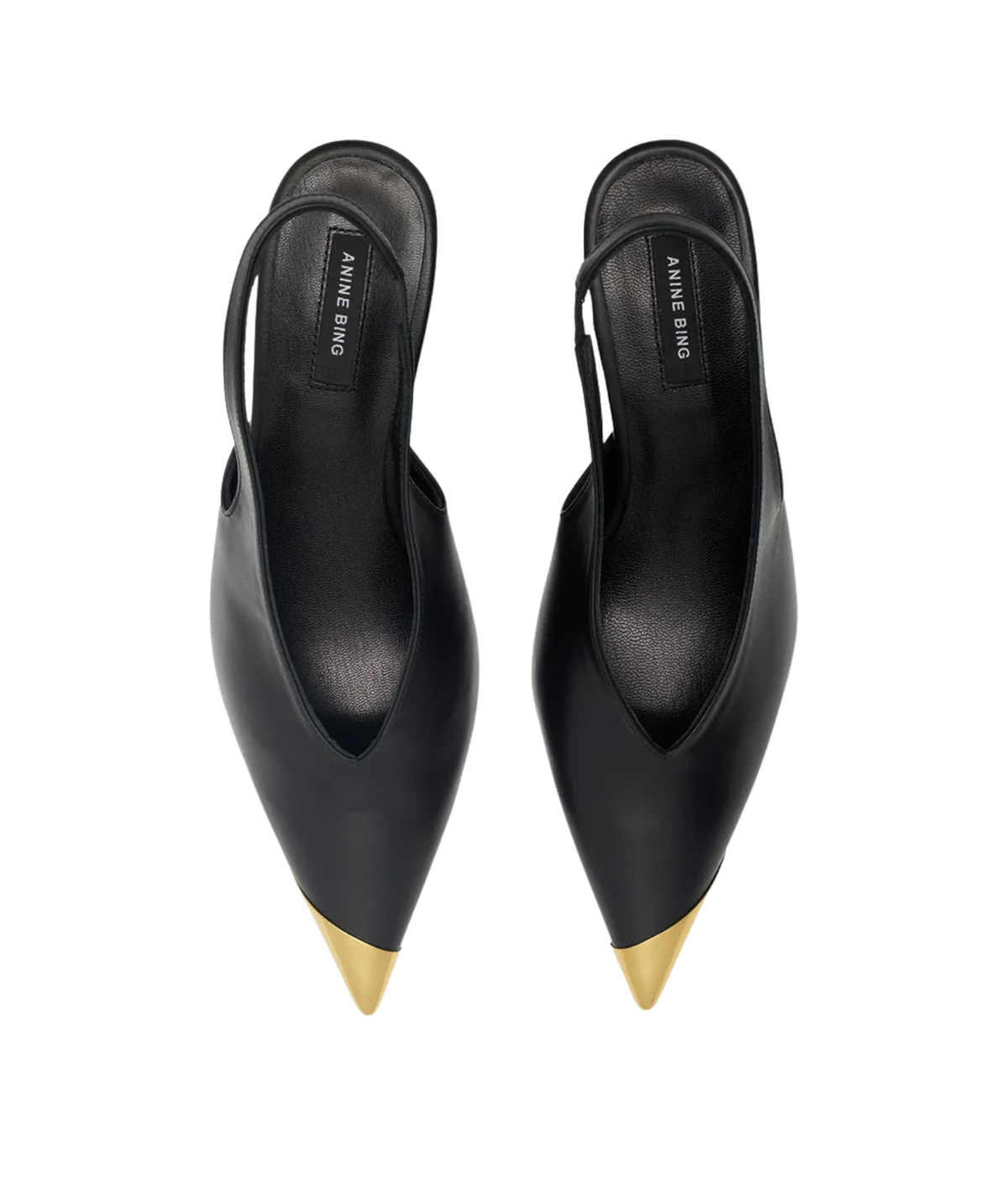 Pair of Anine Bing Nelly Slingback Metal Toe in Black viewed from above, showing the deep V-cut vamp, pointed gold metal toe caps and slingback straps